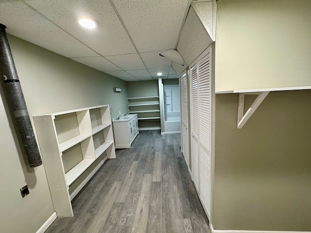 4044 Norwood Dr, Columbus, GA 31907 - corridor featuring dark wood-style floors, baseboards, and a drop ceiling