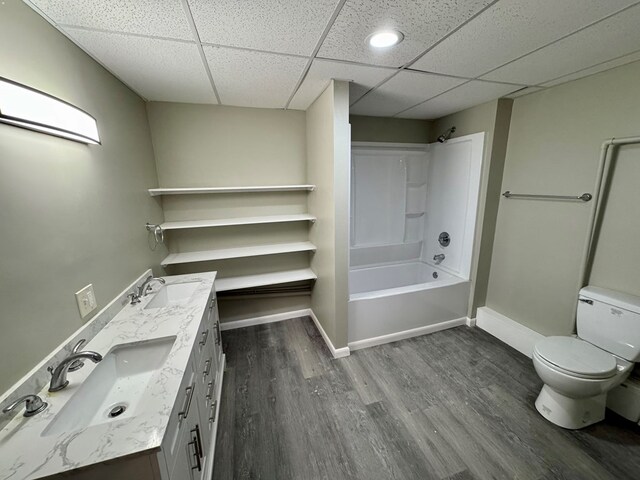 4044 Norwood Dr, Columbus, GA 31907 - bathroom featuring a sink, toilet, baseboards, and wood finished floors