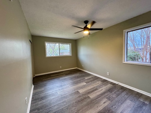 4044 Norwood Dr, Columbus, GA 31907 - spare room featuring dark wood finished floors, baseboards, and ceiling fan