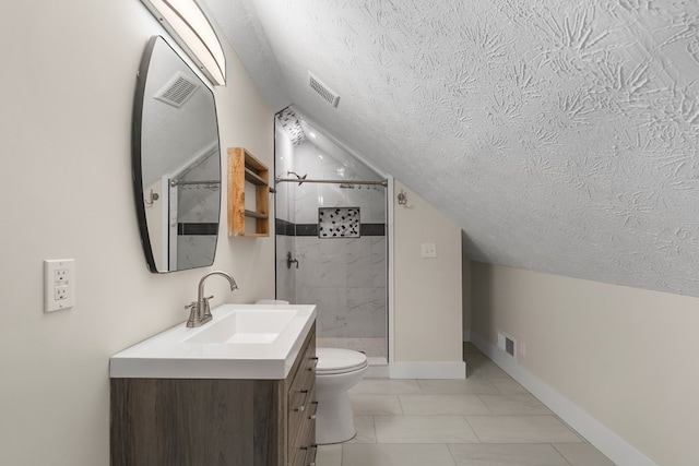 7209 Lullwater Rd, Columbus, GA 31904 - bathroom featuring a textured ceiling, lofted ceiling, vanity, a stall shower, and marble look tiles