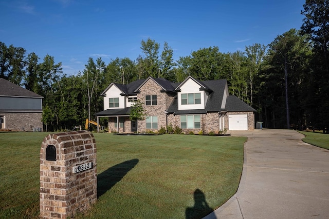 10312 Emerson Way, Midland, GA 31822 - view of front of property featuring concrete driveway, a front yard, stone siding, and a garage