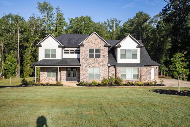 10312 Emerson Way, Midland, GA 31822 - view of front of property with french doors, a front lawn, roof with shingles, and brick siding