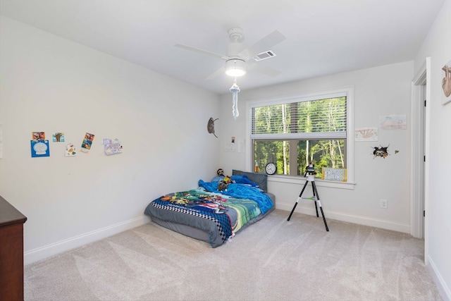 10312 Emerson Way, Midland, GA 31822 - carpeted bedroom with baseboards and ceiling fan