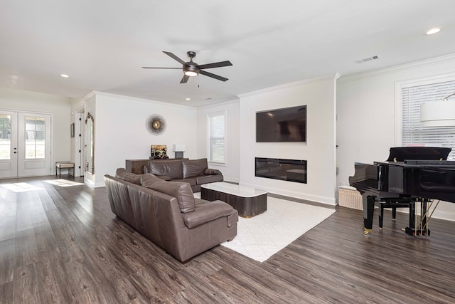 10312 Emerson Way, Midland, GA 31822 - living area with dark wood-type flooring, ceiling fan, recessed lighting, ornamental molding, and a glass covered fireplace