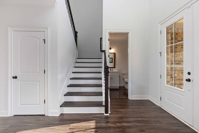 10312 Emerson Way, Midland, GA 31822 - stairs featuring wood finished floors and baseboards