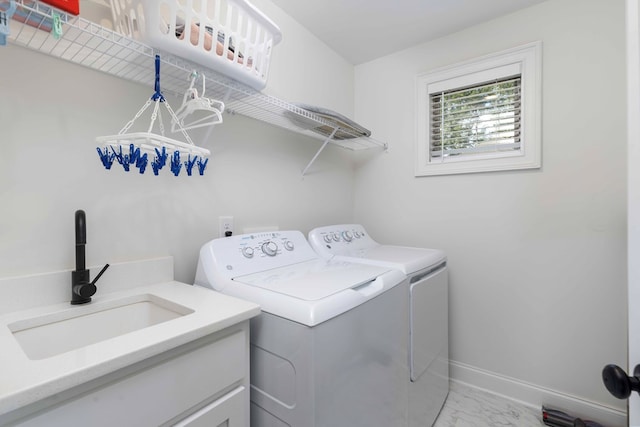 10312 Emerson Way, Midland, GA 31822 - washroom with washing machine and dryer, marble finish flooring, and cabinet space