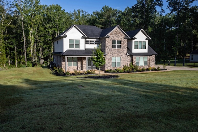 10312 Emerson Way, Midland, GA 31822 - view of front facade featuring a front lawn and stone siding
