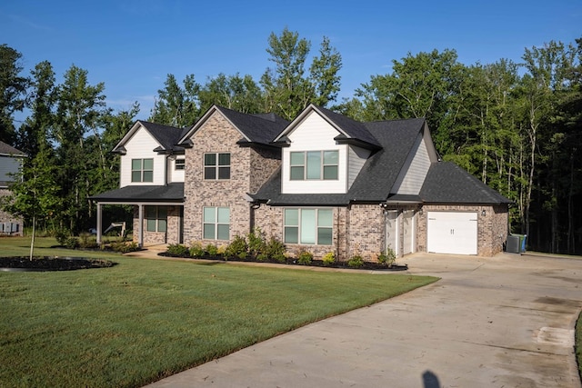 10312 Emerson Way, Midland, GA 31822 - view of front of house featuring driveway, an attached garage, a front lawn, roof with shingles, and brick siding