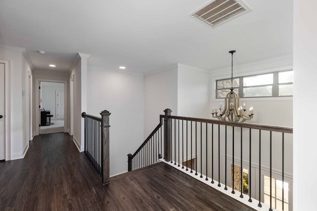 10312 Emerson Way, Midland, GA 31822 - corridor with an upstairs landing, wood finished floors, a chandelier, recessed lighting, and crown molding