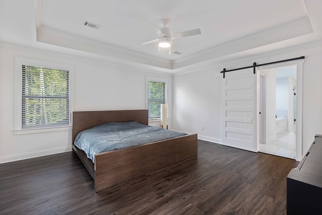 10312 Emerson Way, Midland, GA 31822 - bedroom with a raised ceiling, a barn door, ornamental molding, dark wood-style floors, and a ceiling fan