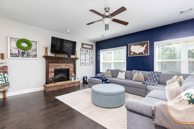 7514 Garrett Rd, Midland, GA 31820 - living room with ceiling fan, wood-type flooring, plenty of natural light, and a fireplace