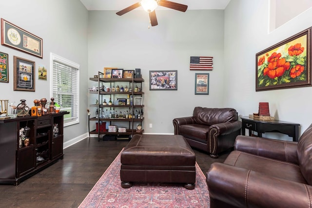7514 Garrett Rd, Midland, GA 31820 - living area with ceiling fan, dark wood-style flooring, and a towering ceiling