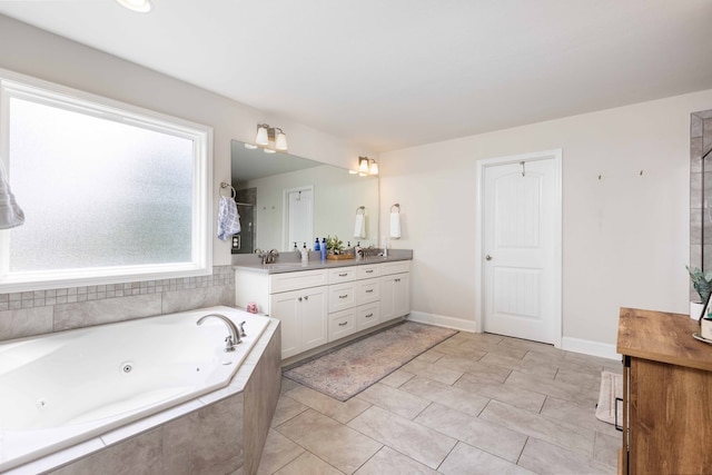 7514 Garrett Rd, Midland, GA 31820 - full bathroom with double vanity and a jetted tub