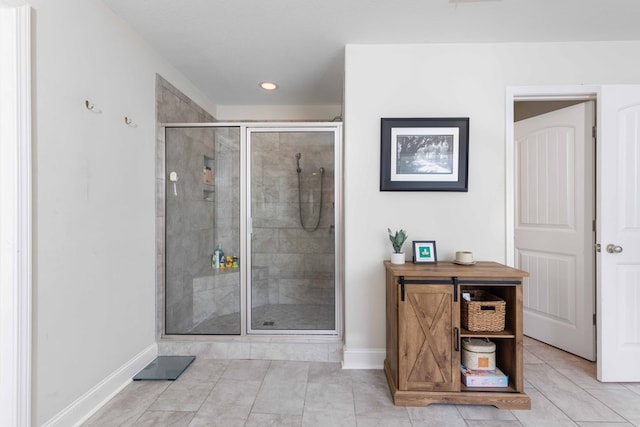 7514 Garrett Rd, Midland, GA 31820 - bathroom with a stall shower, tile patterned floors, and recessed lighting