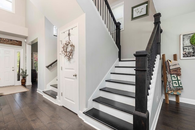 7514 Garrett Rd, Midland, GA 31820 - stairway featuring hardwood / wood-style flooring and a high ceiling