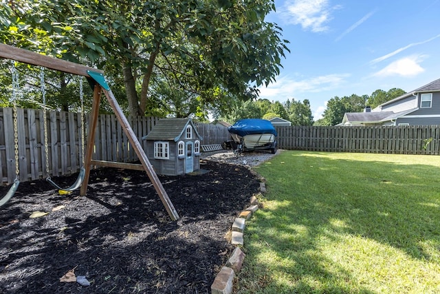 7514 Garrett Rd, Midland, GA 31820 - fenced backyard with a storage shed