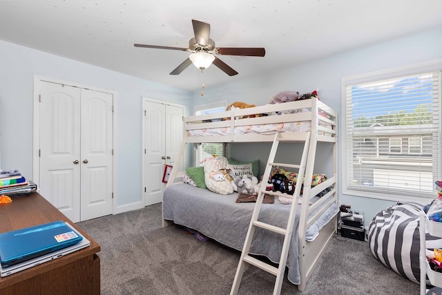 7514 Garrett Rd, Midland, GA 31820 - bedroom featuring carpet, two closets, and ceiling fan