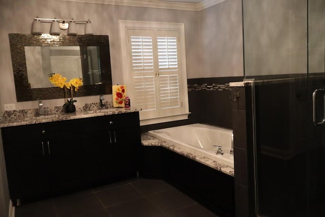 7400 Standing Boy Rd, Columbus, GA 31904 - bathroom featuring double vanity, ornamental molding, a bath, a shower stall, and tile patterned floors