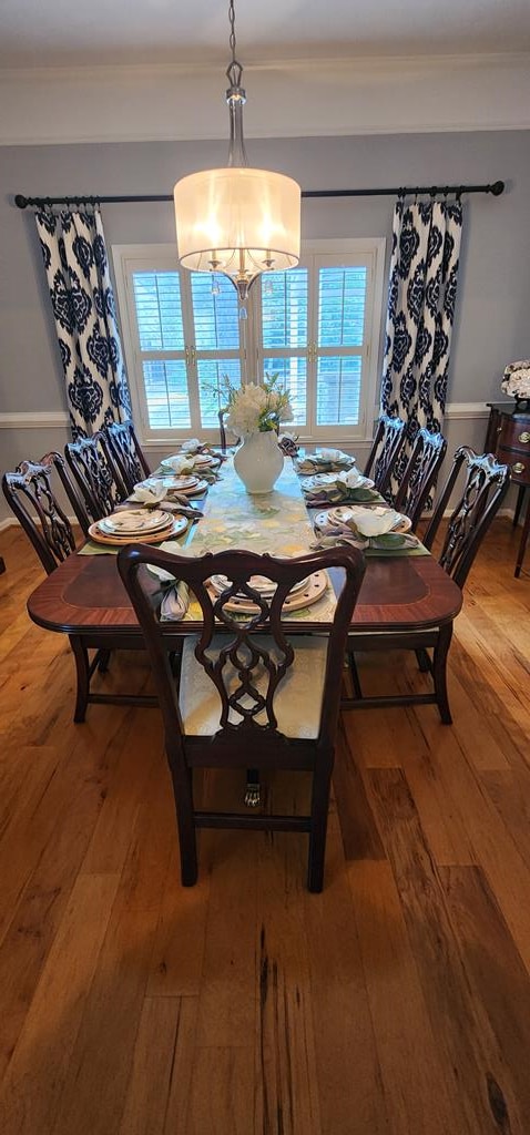 7400 Standing Boy Rd, Columbus, GA 31904 - dining space with hardwood / wood-style flooring, a chandelier, and crown molding