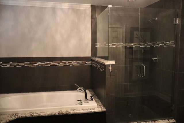 7400 Standing Boy Rd, Columbus, GA 31904 - bathroom featuring a garden tub, a stall shower, and crown molding