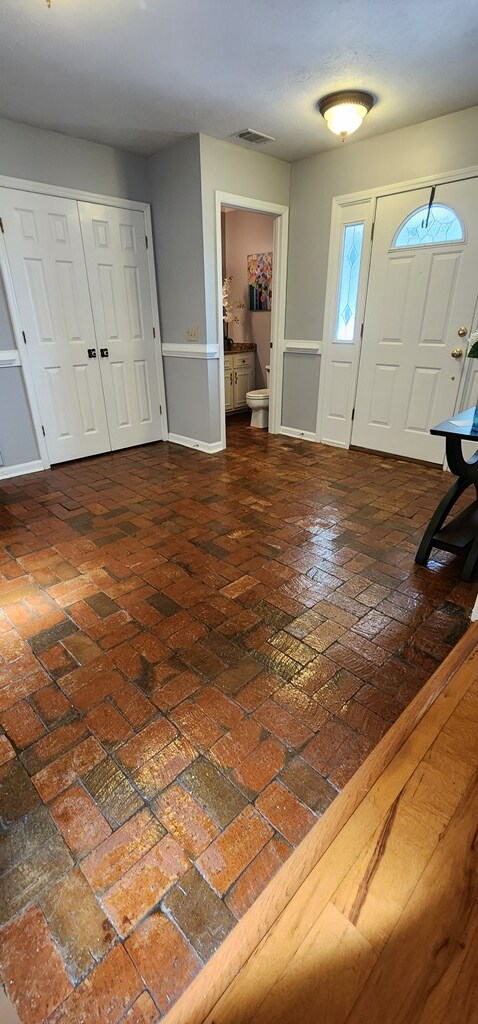 7400 Standing Boy Rd, Columbus, GA 31904 - entryway with brick flooring and baseboards