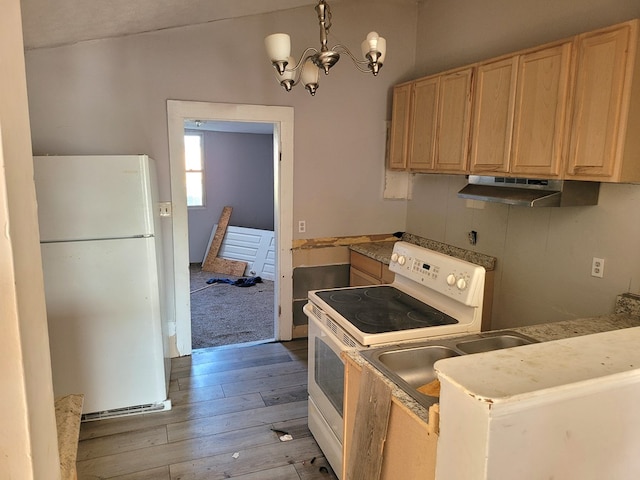 kitchen featuring light wood-style flooring, light brown cabinetry, a chandelier, white appliances, and under cabinet range hood