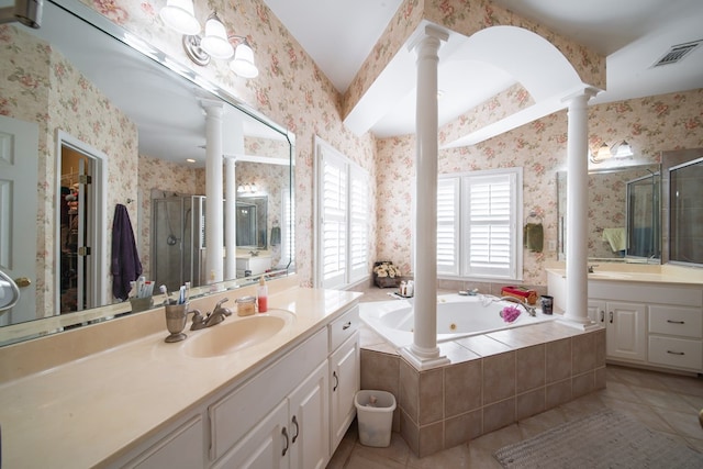 bathroom featuring vanity, tile patterned floors, independent shower and bath, and ornate columns