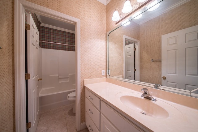 full bathroom featuring toilet, bathing tub / shower combination, ornamental molding, vanity, and tile patterned flooring