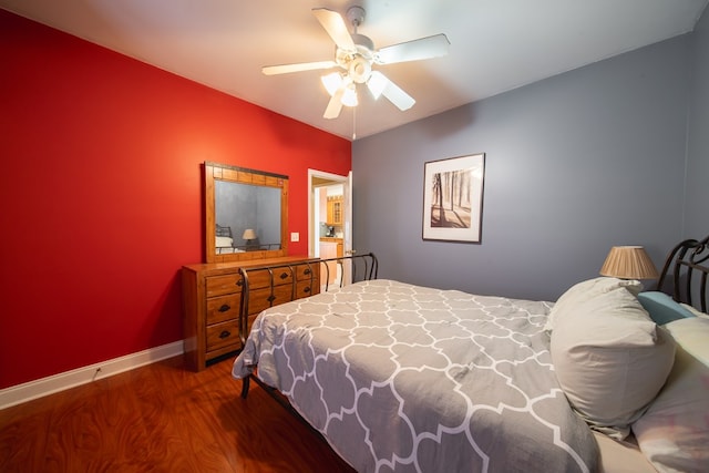 bedroom featuring dark hardwood / wood-style floors and ceiling fan