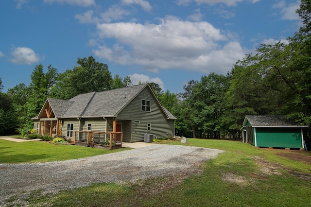 299 Savior Ln, Hamilton, GA 31811 - view of front of property with a shed, a front lawn, a wooden deck, and gravel driveway