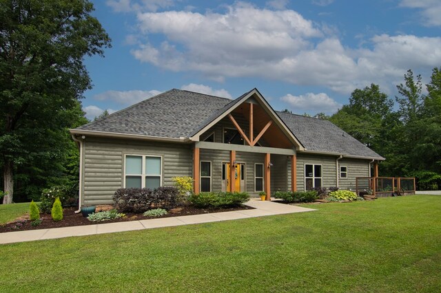 299 Savior Ln, Hamilton, GA 31811 - view of front of home featuring a front lawn and a shingled roof