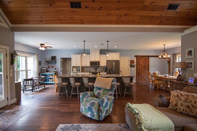 299 Savior Ln, Hamilton, GA 31811 - living room featuring recessed lighting, dark wood-type flooring, a chandelier, and ceiling fan