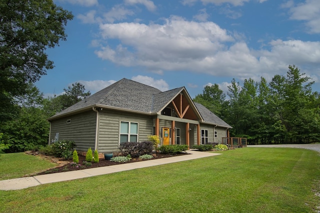 299 Savior Ln, Hamilton, GA 31811 - view of front of house featuring a front lawn and a shingled roof