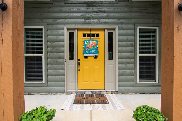 299 Savior Ln, Hamilton, GA 31811 - view of exterior entry with faux log siding