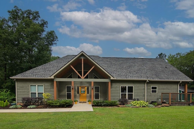 299 Savior Ln, Hamilton, GA 31811 - view of front of home with a front lawn and roof with shingles