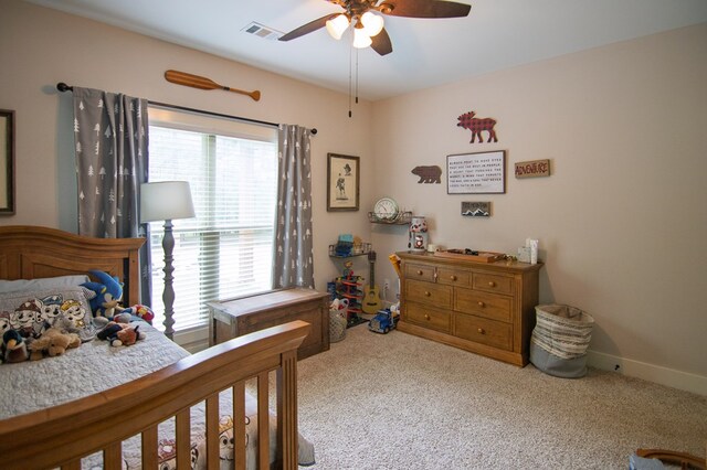 299 Savior Ln, Hamilton, GA 31811 - carpeted bedroom featuring a ceiling fan and baseboards