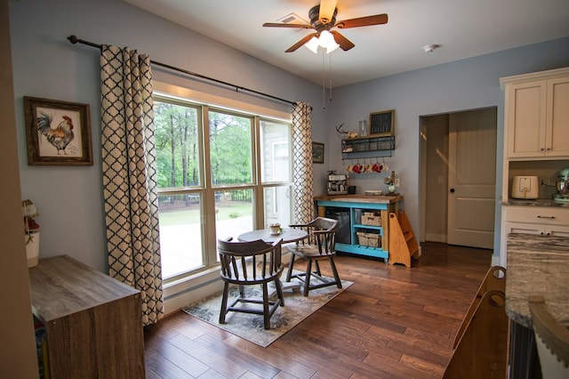 299 Savior Ln, Hamilton, GA 31811 - dining room featuring ceiling fan and dark wood-style flooring