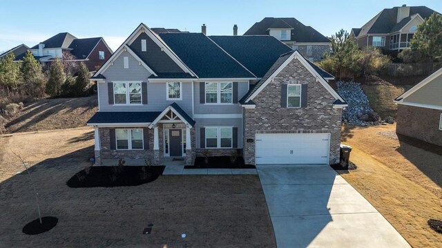 254 Clearbrook Ln, Columbus, GA 31904 - view of front of home featuring concrete driveway, a garage, a residential view, and brick siding