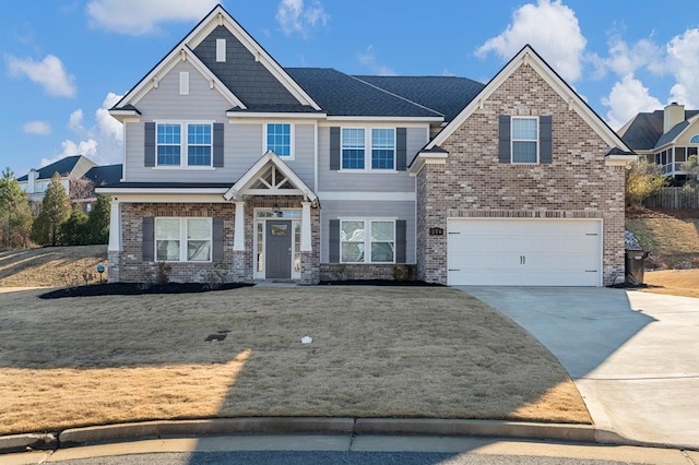 254 Clearbrook Ln, Columbus, GA 31904 - craftsman inspired home featuring a garage, driveway, brick siding, and a front lawn