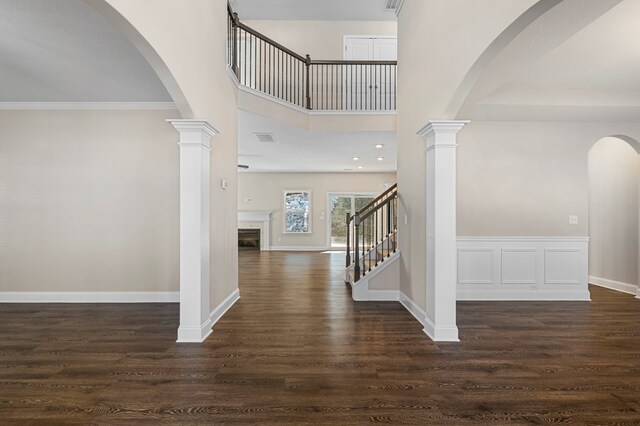 254 Clearbrook Ln, Columbus, GA 31904 - entrance foyer with a fireplace, dark wood finished floors, baseboards, and stairway