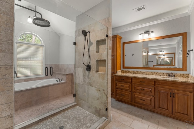 30 Pleasant Ct, Cataula, GA 31804 - full bath featuring a shower stall, tile patterned floors, vanity, and a bath