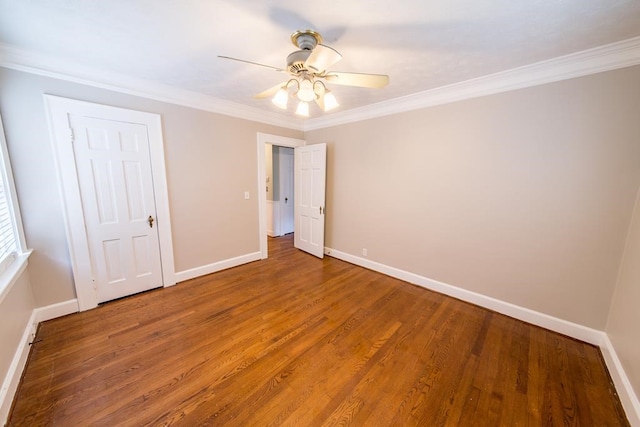 unfurnished bedroom with crown molding, ceiling fan, and wood-type flooring