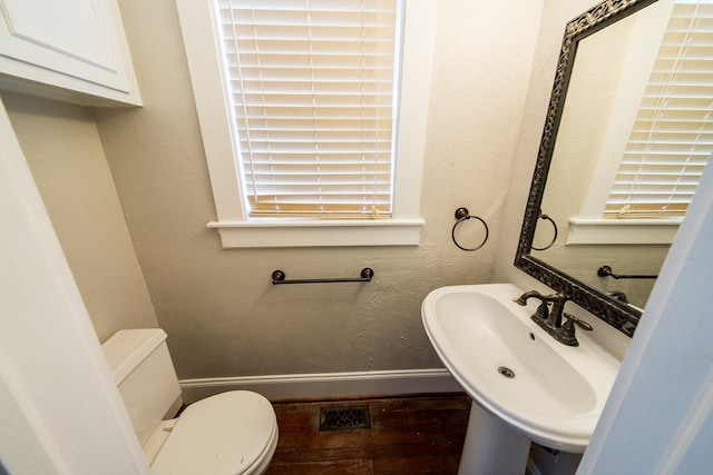 bathroom with toilet and sink