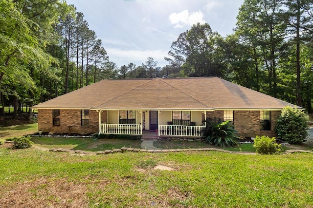 view of side of property with a lawn and a garage