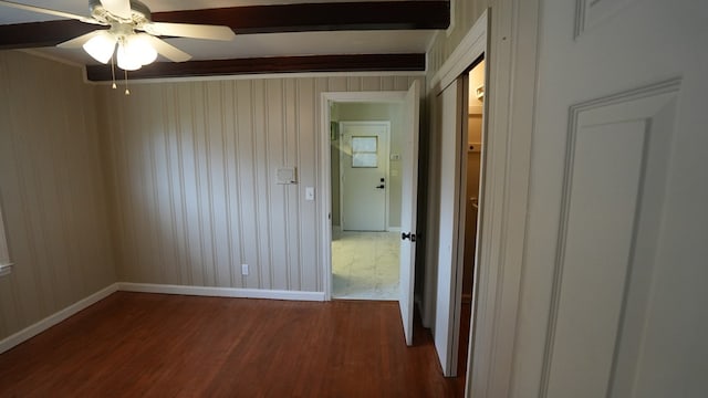 4525 Sentry St, Columbus, GA 31907 - empty room featuring dark wood-style floors, beamed ceiling, ceiling fan, and wood walls