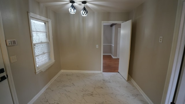 4525 Sentry St, Columbus, GA 31907 - unfurnished dining area featuring light marble finish flooring and baseboards