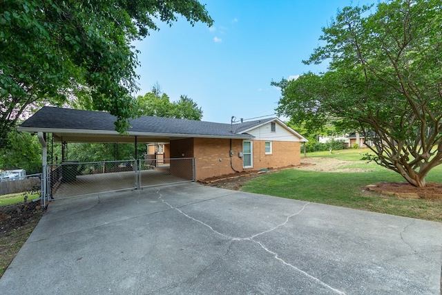 3068 Apache Dr, Columbus, GA 31909 - view of front of property featuring a gate, concrete driveway, and brick siding