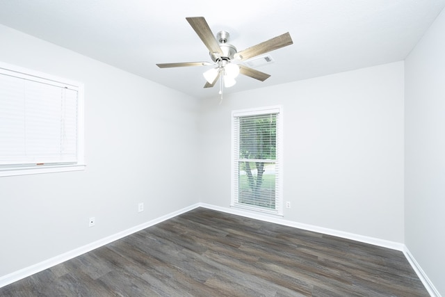 3068 Apache Dr, Columbus, GA 31909 - empty room featuring dark wood-type flooring, a ceiling fan, and baseboards
