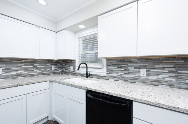 3068 Apache Dr, Columbus, GA 31909 - kitchen featuring dishwasher, a sink, white cabinetry, ornamental molding, and tasteful backsplash