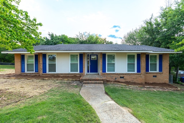 3068 Apache Dr, Columbus, GA 31909 - single story home featuring brick siding, a front lawn, covered porch, and crawl space